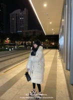 Белый пуховик