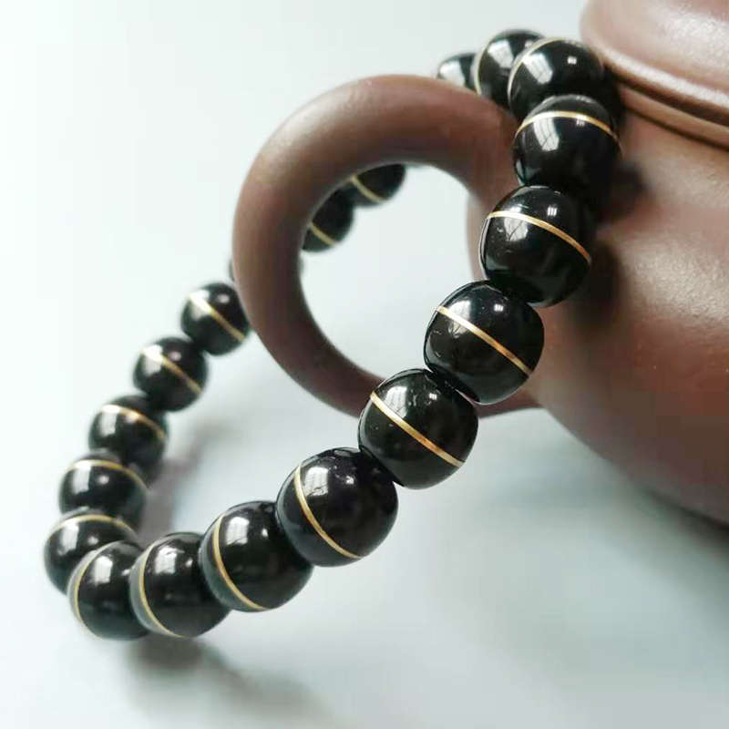 Indonesia's old stock coconut bracelet with single ring of male inlaid bronze first-line drugmaker black gold hand strings to play old style barrel Buddha pearl prayer beads