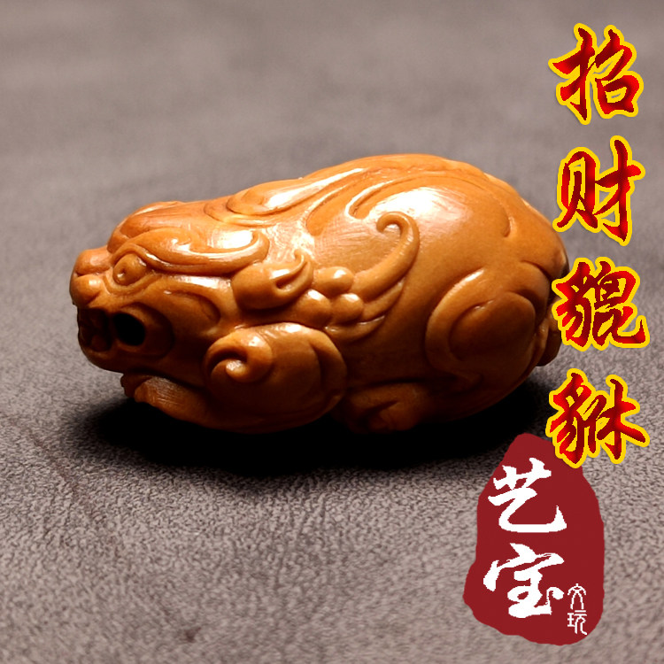 Sunan Gong Pixiu Pixiu olive core Hu carving single seed three-way animal face dragon head Buddha head Tibetan pacifier Wenwan