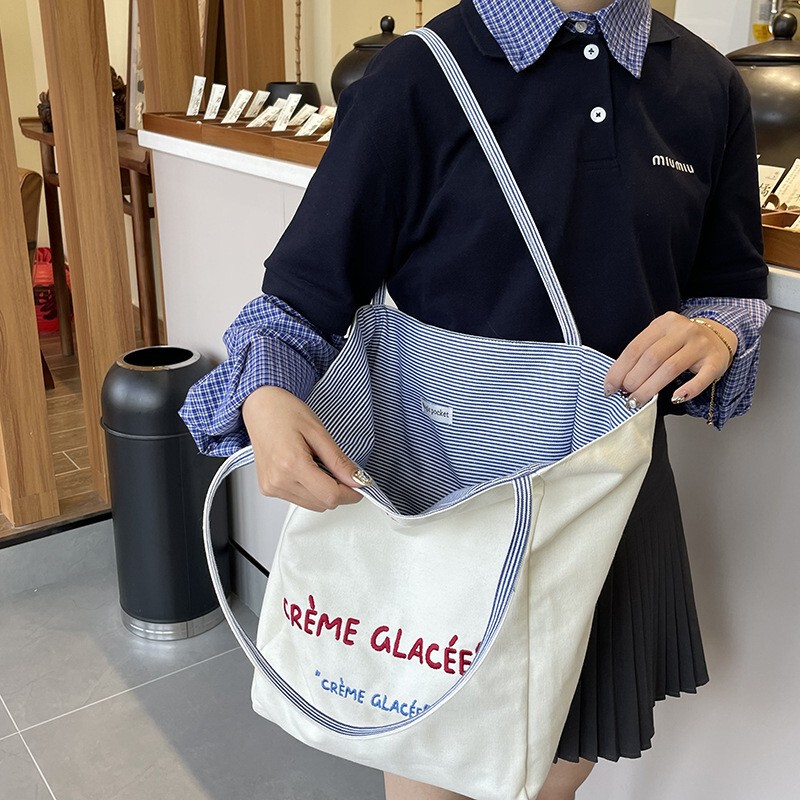 New Korean Style Reversible Striped Versatile Large-Capacity High-Quality Embroidered Student Commuter Shoulder Canvas Bag New Korean Style Reversible Striped Versatile Large-Capacity High-Quality Embroidered Student Commuter Shoulder Canvas Bag