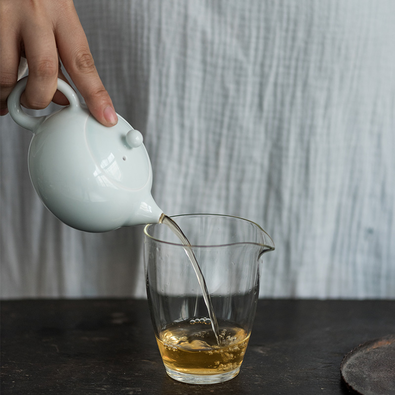 Sweet white glazed ceramic story ball hole, xi shi pot of filtering household white porcelain tea teapot tea by hand