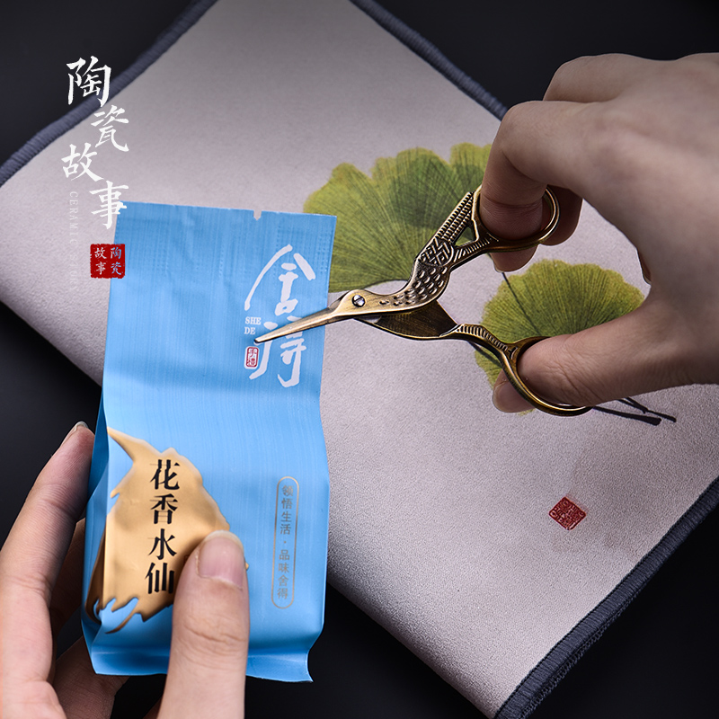 Ceramic story crane tea Japanese stainless steel portable small scissors cut tea tea tea tea bag with zero