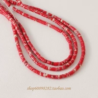 Золотой красный синтетический камень