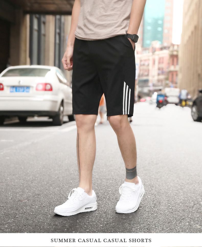 Mùa hè quần short nam năm quần lỏng quần thể thao giản dị Mùa hè quần 5 điểm quần trong quần lớn quần ống rộng nam