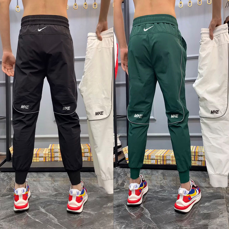 2023 summer thin ice silk quick-drying pants trendy brand Korean version of sports casual pants Kuaishou Douyin same style men's harem pants