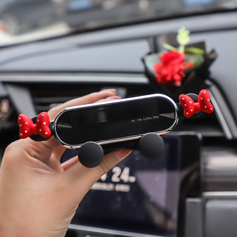 Mobile phone car mobile phone bracket 2022 new creative cute snap-in car interior car air outlet navigation support bracket