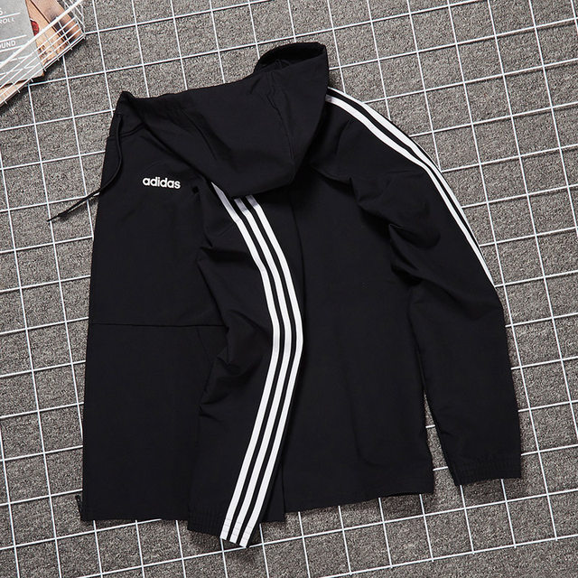 Adidas Jacket Men's 2021 Autumn ເວັບໄຊທ໌ທາງການຂອງແທ້ກິລາ Windproof Casual Hooded Jacket DQ3066