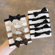 South Korea East Gate bow hair rope ins Wind head rope simple temperament leather case Hairband summer leather band hair accessories female