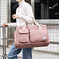 Розовая сумка для путешествий