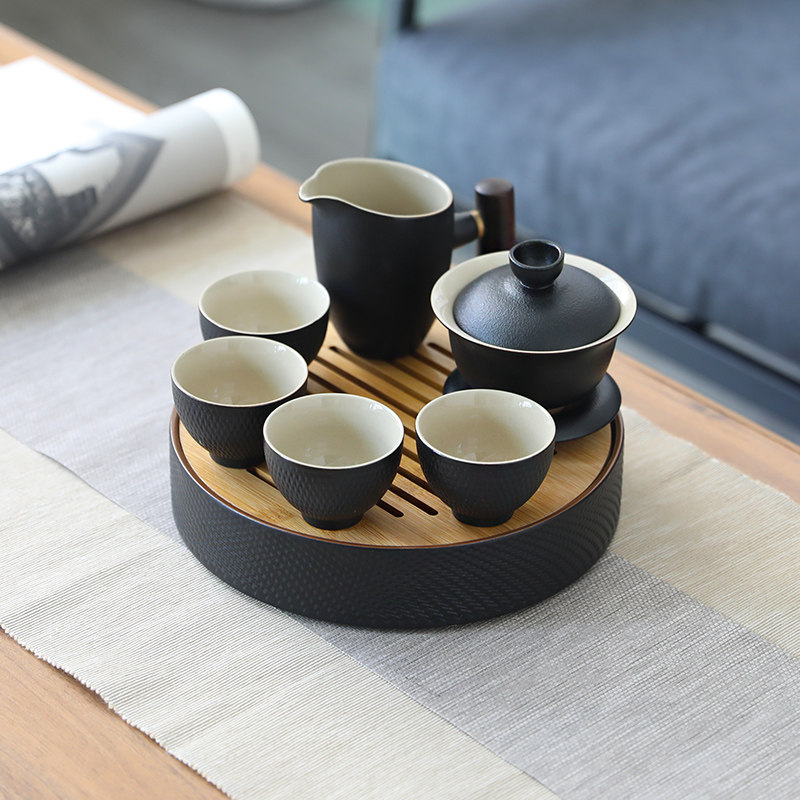 Black pottery household kung fu tea set small set Japanese simple ceramic tea tray one pot four cups outdoor travel bag convenient