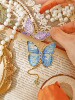 Yujian Eslite Butterfly Language among Flowers series metal bookmarks, a hollow literary brass souvenir for teachers during graduation season