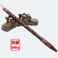 Темно -коричневый большой листовой древесина