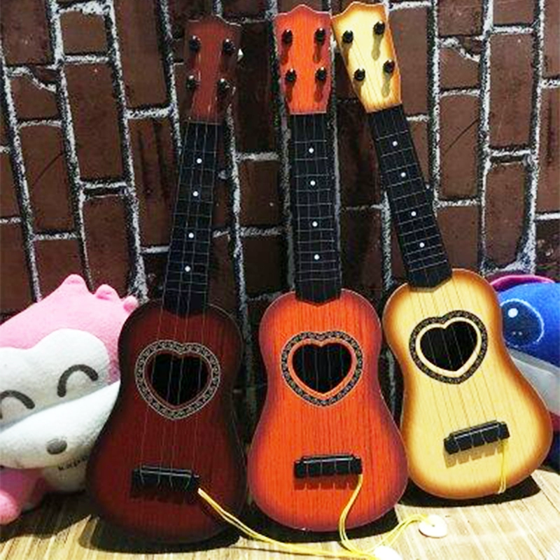 Guitar đồ chơi trẻ em có thể chơi mô phỏng ukulele người mới bắt đầu nhạc cụ âm nhạc cậu bé cô gái guitar nhỏ đồ chơi thông minh cho bé