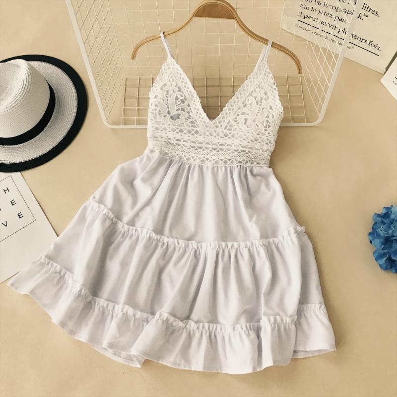 Châu âu và Hoa Kỳ kỳ nghỉ phong cách sexy ren khâu V-Cổ lớn backless bow cao eo tai gỗ đu lớn Một từ ăn mặc váy chữ a dáng dài