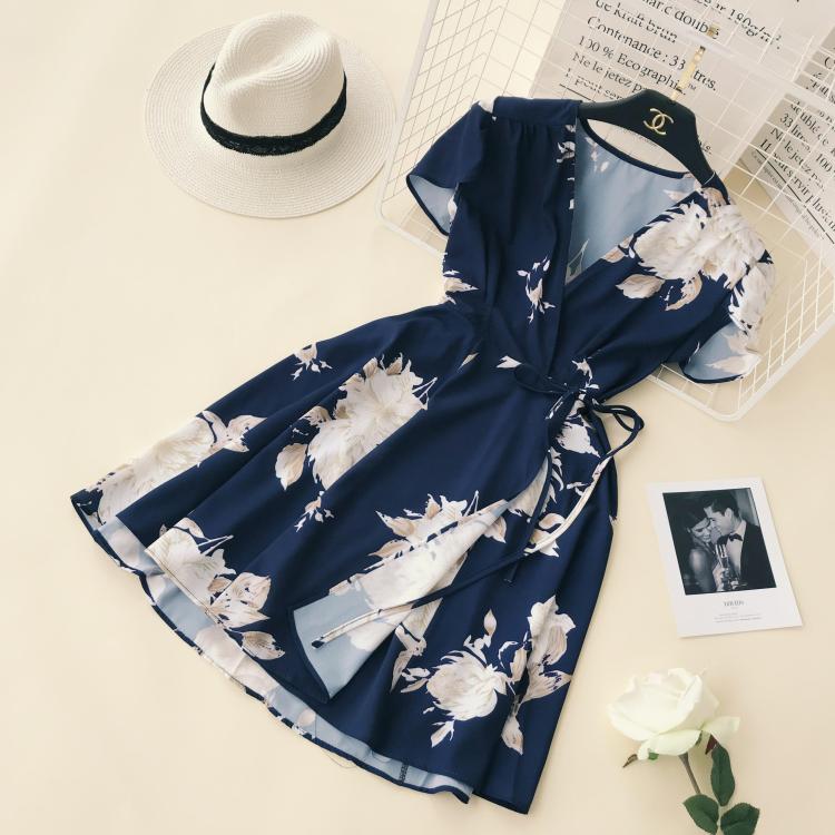 2018 mùa hè mới V-cổ retro in ngắn tay eo với một mảnh bất thường kỳ nghỉ bên bờ biển ăn mặc váy xoắn bụng