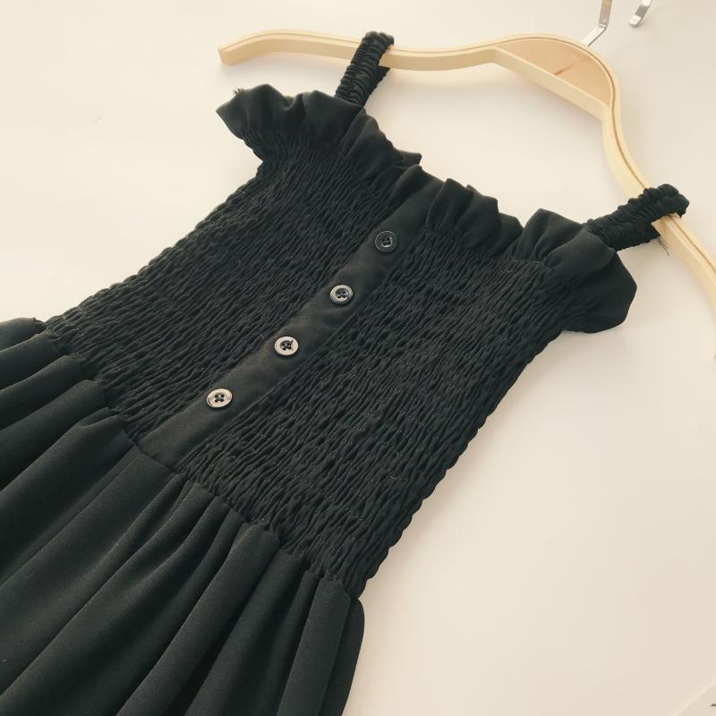 Váy dài bãi biển hè 2018 mới xếp li ống tai bằng gỗ trang trí nút cao eo thon cao chân rộng quai jumpsuit váy chiết eo cao	