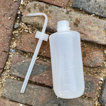 Multi-meat watering kettle sprinkler extrusion drip kettle transparent pointed mouth elbow long mouth size household hand kneading watering pot