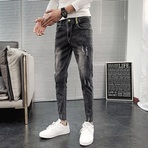 Jeans men Korean version of the trend slim small feet Joker hole 2020 Spring and Autumn nine points Tide brand casual long pants