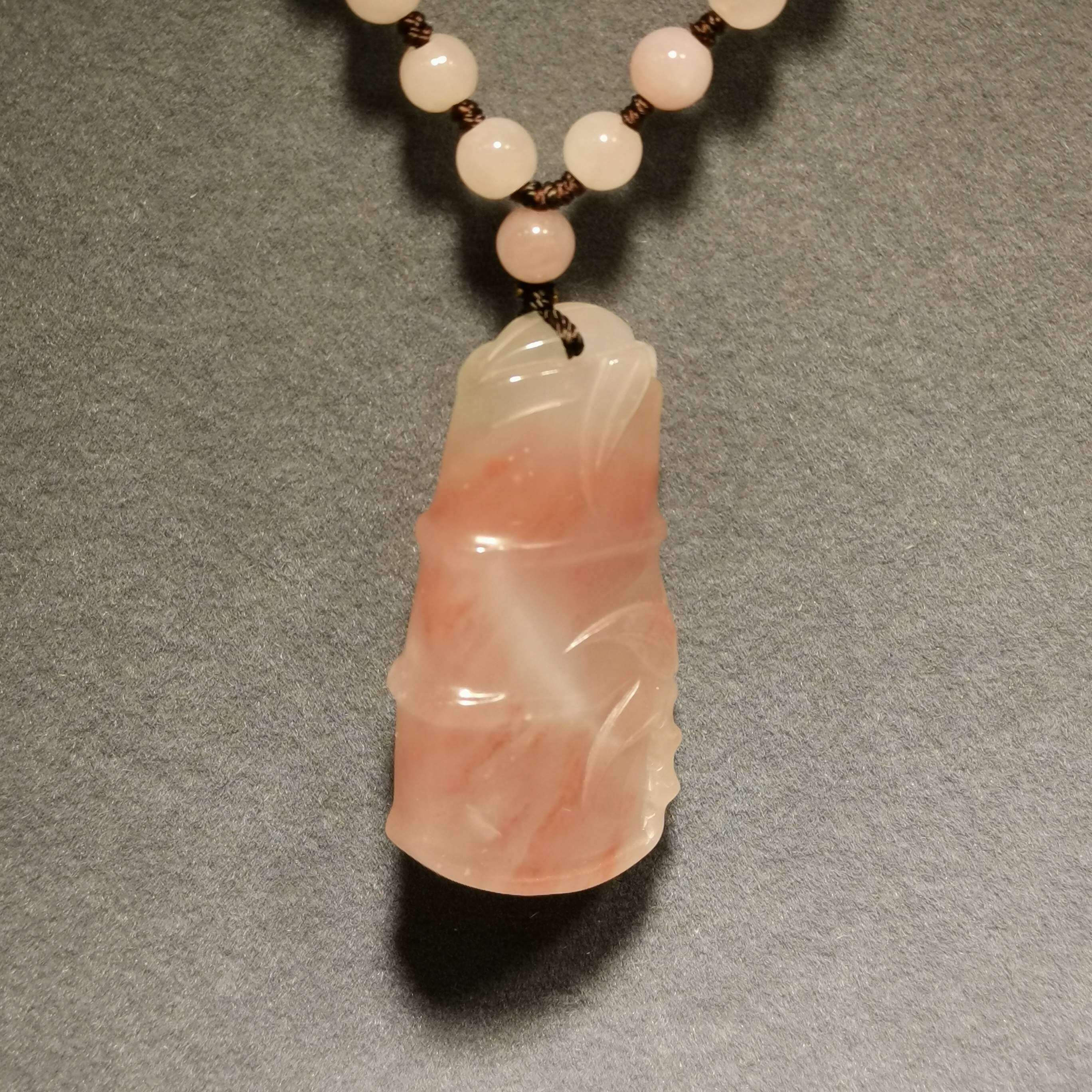 Guilin chicken blood jade dragon wins red jasper stone natural raw stone pendant tag for men and women