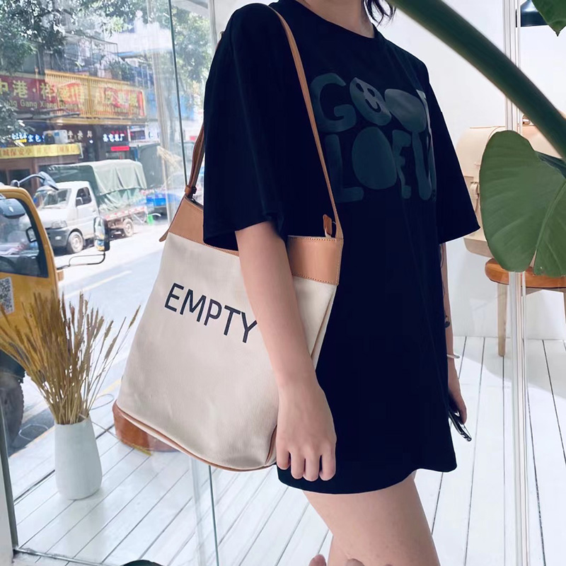 Canvas with cowhide bucket bag women's single shoulder bag Messenger bag large capacity Japanese casual design trendy