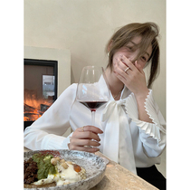 cchenchenchen_high-end bowknot shirt womens early autumn V-neck French niche design sense white top
