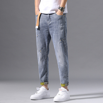 Hong Kong high-end jeans mens Tide brand spring summer 2020 hole elastic slim feet light color long pants