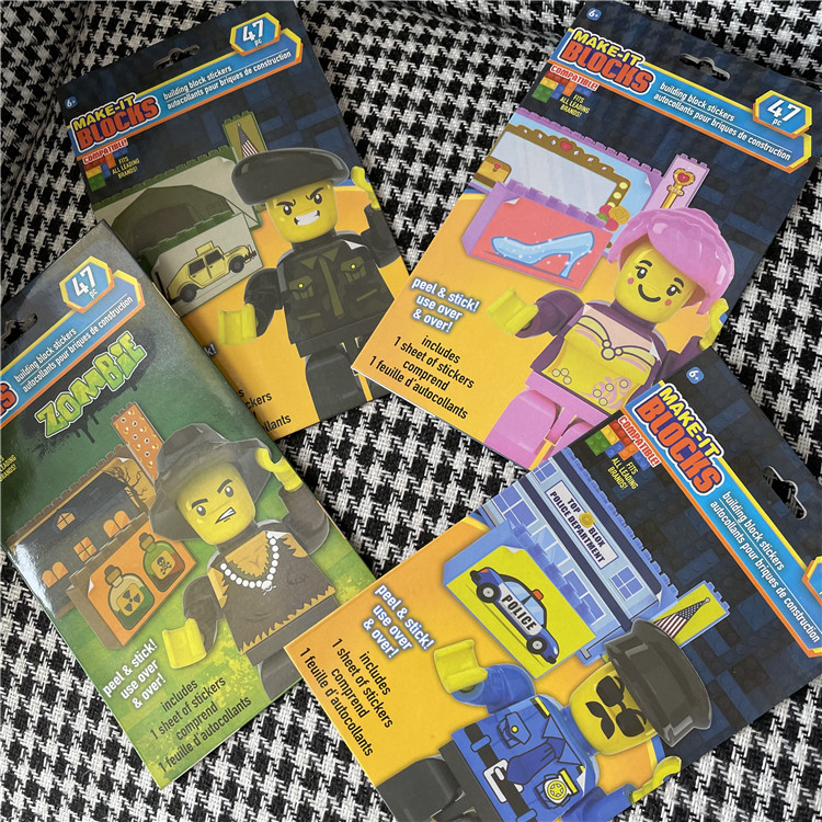 A picture of a small child's sticker and a puzzle toy