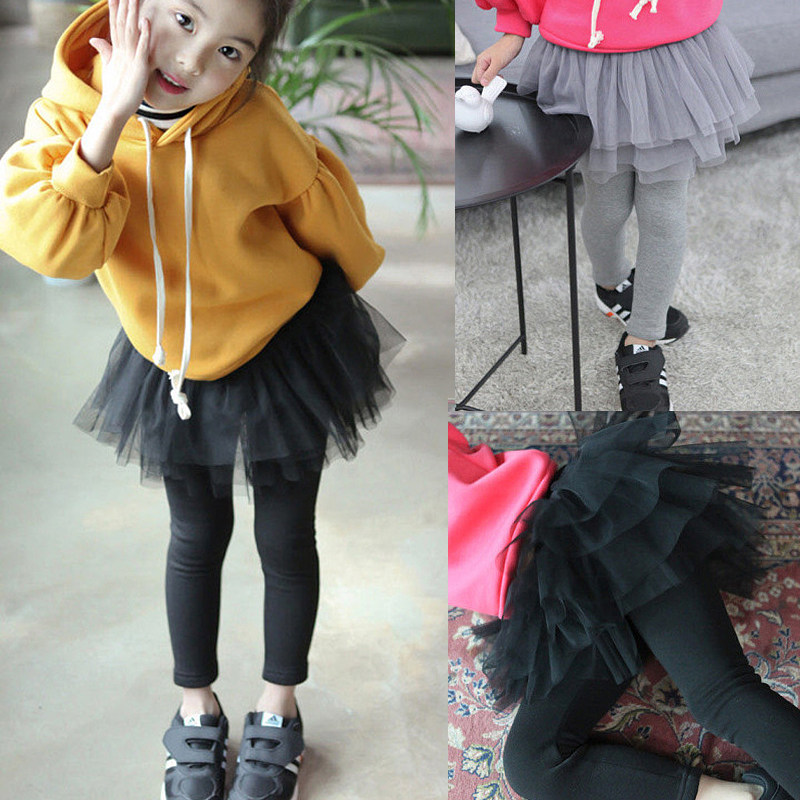 Girl pure cotton elastic pompoled skirts spring and autumn Korean children's dress girl baby fake two pieces of wearing trousers