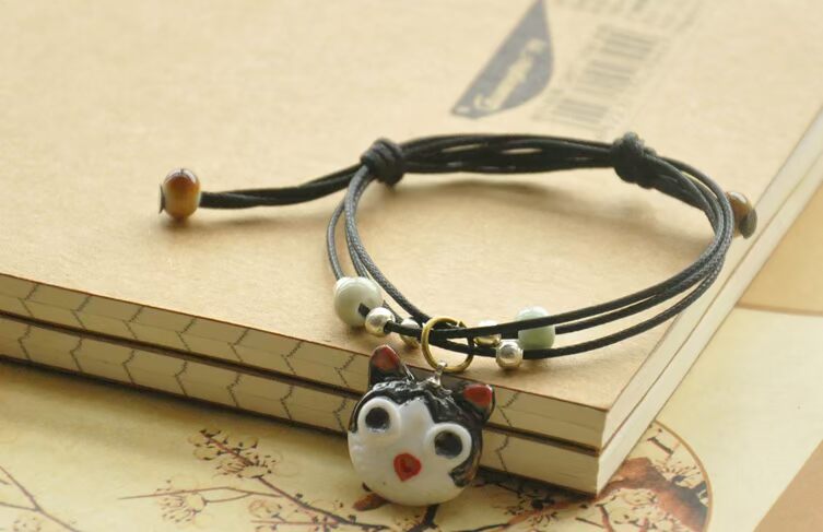 Handmade sáng tạo đồ trang sức nhỏ Jingdezhen gốm sứ dễ thương mèo vòng tay người yêu đồ trang sức unisex bện dây điều chỉnh vòng tay cao su