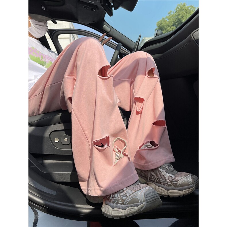 粉色破洞裤男女秋季新款美式高街阔腿拖地裤潮牌休闲垂感运动长裤图片