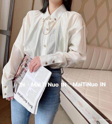 2021春装韩洋气金属扣下摆不规则衬衣女宽松打底，女装，麦缇诺