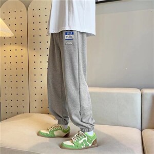 男春季潮流时尚休闲长裤贴标束脚哈伦裤B3881P32