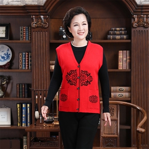 2024秋冬新款中老年女款V领纽扣花纹仿开衫背心马甲图片