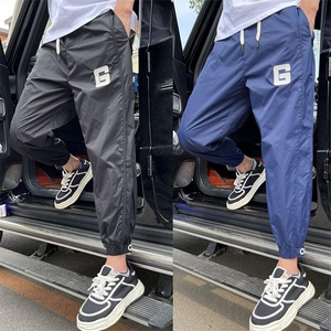夏季男士冰丝薄款透气束脚空调裤韩版潮流青年哈伦裤男小脚九分裤图片
