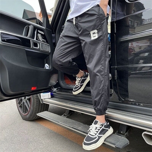 夏季男士冰丝薄款透气束脚空调裤韩版潮流青年哈伦裤男小脚九分裤图片