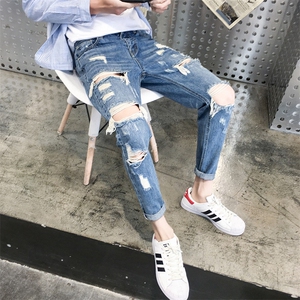 港风秋款男牛仔裤破洞潮男情侣女裤九分小脚牛仔裤n图片