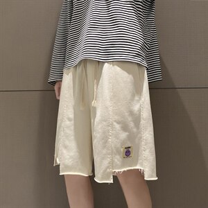 ins港风 笑脸贴标 撕边破洞情侣休闲五分裤短裤A042-D825-P35图片