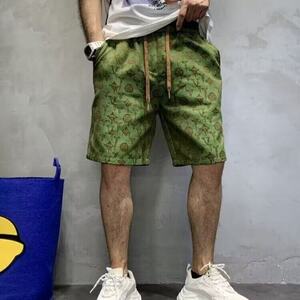 潮牌字母提花短裤男夏季高级感绿色休闲五分裤修身百搭潮流沙滩裤图片
