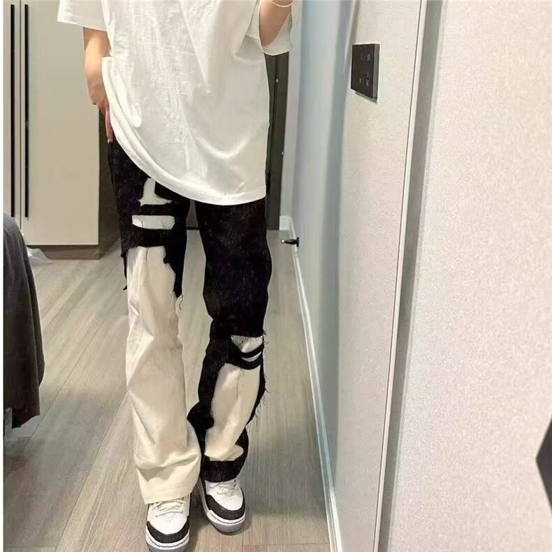 美式vibe高街黑白拼接撞色牛仔裤男女新款显瘦破洞宽松直筒长裤子图片