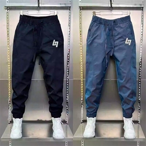 潮牌冰丝速干休闲裤男士夏季薄款2025新款宽松束脚九分运动裤男款图片
