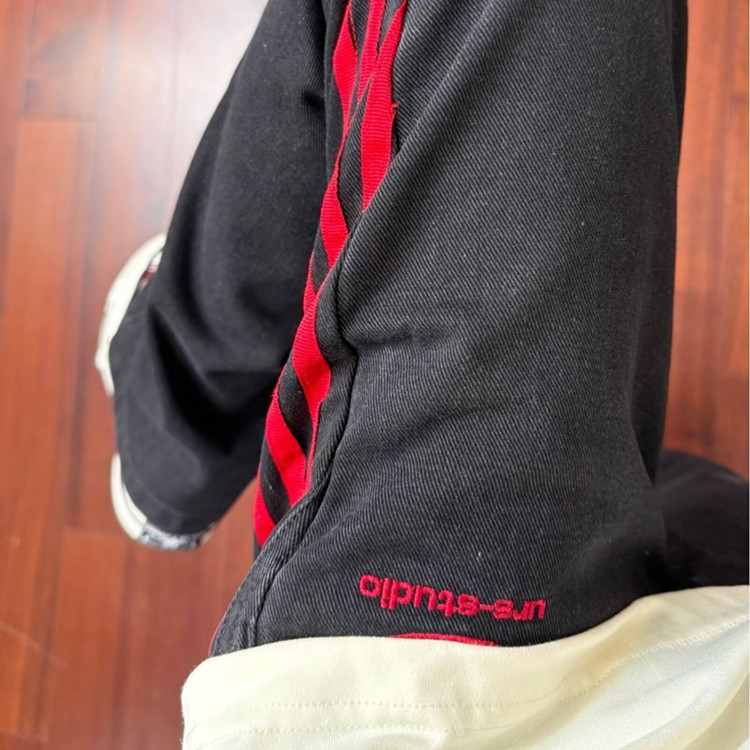 三杠条纹红黑撞色拼接显瘦微喇牛仔裤男小众设计感美式工装直筒裤图片