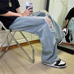 新款男女高街破洞宽直筒个性潮牌牛仔裤长裤子NZ689 批45 控68图片