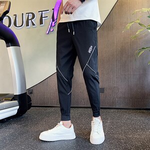 社会小伙裤子痞帅潮牌网红裤修身小脚裤精神束脚九分裤A18P45控68图片