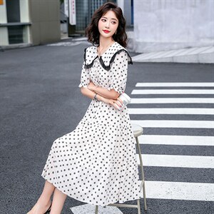 法式复古碎花连衣裙女2025新款小众收腰显瘦娃娃领雪纺长裙图片