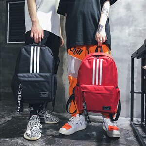红潮时尚尼龙条纹双肩包运动双肩背包中性包户外包图片