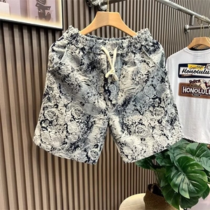 夏季新款设计感花卉花色短裤男时尚百搭宽松青花瓷五分裤休闲裤子图片