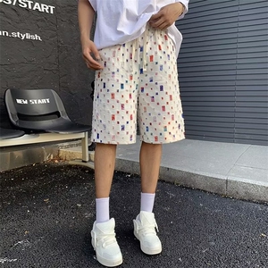 新款男女休闲短裤潮牌时尚破洞镂空宽松痞帅情侣款运动五分裤图片