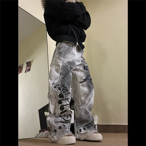 美式街头水洗做旧牛仔裤男女宽松潮流音符星星元素印花阔腿拖地裤,黑色针织马甲背心搭配打底衫图片