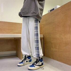 秋季玉米粒华夫格贴标抽绳格纹拼接休闲裤XZ604-KP43-P55控68,喇叭裤怎么搭配才有女人味图片