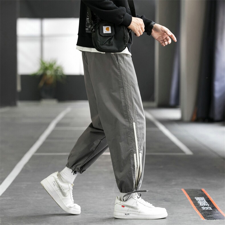 男士新款休闲裤侧边条纹韩版潮流抽绳束脚运动裤宽松DS876T图片